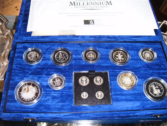 2 cased silver proof coins sets, The Queens 80th Birthday and Millenium Collection